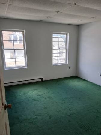 Dark room before AI photo editing service - poor lighting and low quality