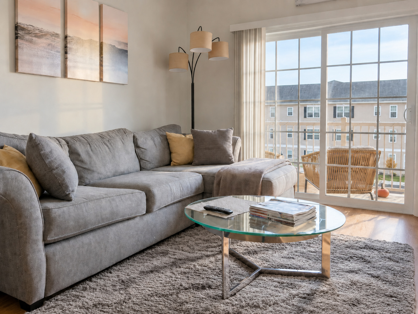 FrameLifter enhancement with brighter lighting, a tidier table and sofa, and the original rug retained